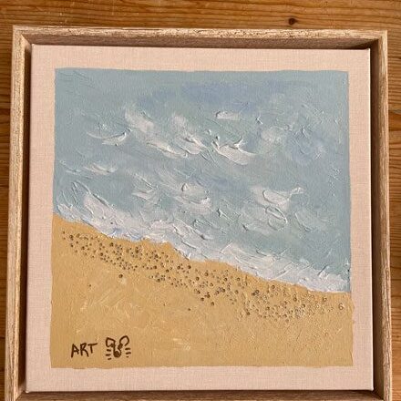 A painting of the beach with seagulls flying in it.