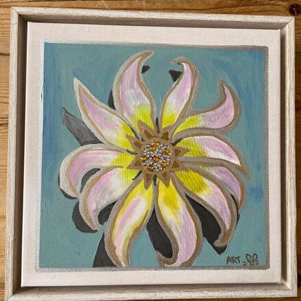 A painting of a flower with yellow and pink petals.